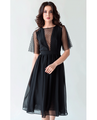 Чорна коктейльна сукня з гарним декольте