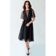 Черное коктейльное платье с красивым декольте