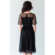 Черное коктейльное платье с красивым декольте
